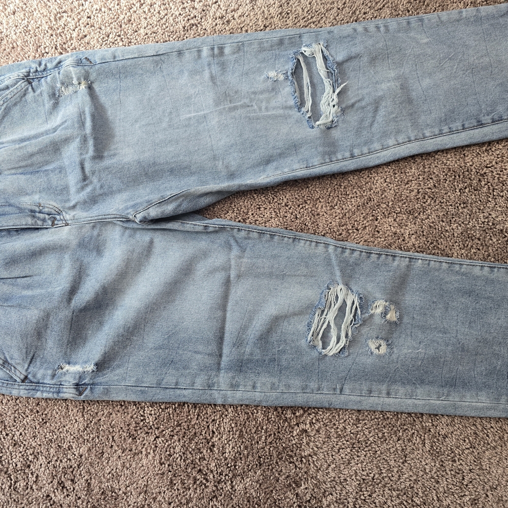 Relaxed Blue Jeans with Natural Distressing